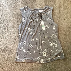 Calvin Klein size L gray with white flour top